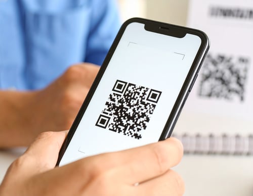 Firefly_QR code being scanned by person 463519-1